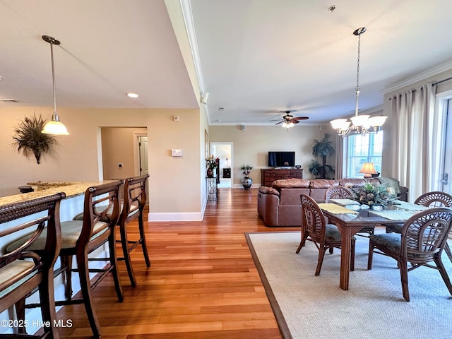 6832 Main St Unit 317, Wilmington, NC 28405 - dining space featuring a chandelier, light wood finished floors, ornamental molding, ceiling fan, and recessed lighting