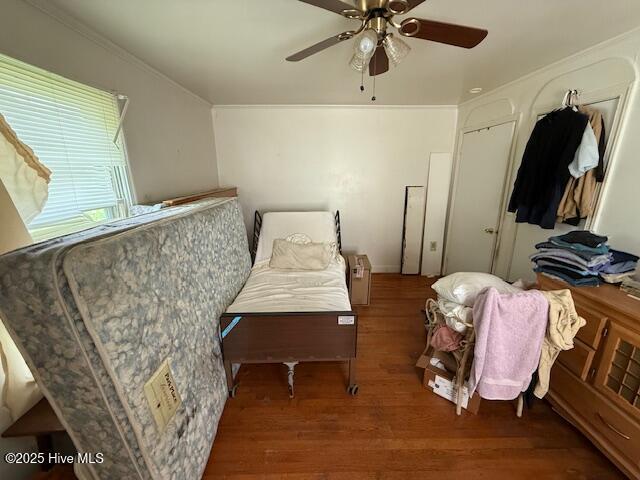 113 Winesett Cir, Plymouth, NC 27962 - bedroom with wood finished floors, a ceiling fan, and crown molding