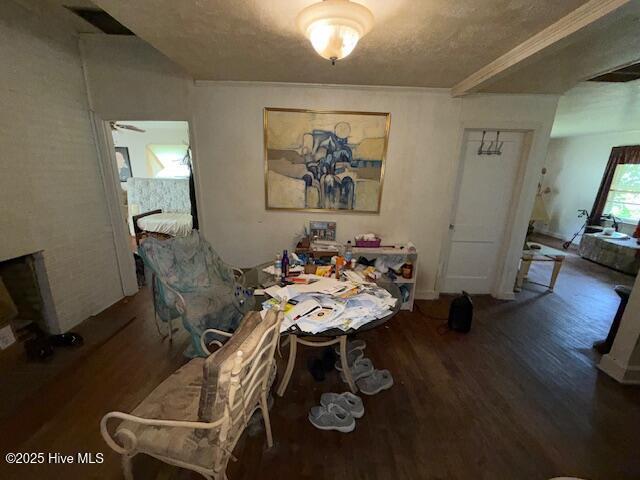 113 Winesett Cir, Plymouth, NC 27962 - dining space with wood finished floors, a textured ceiling, and a fireplace