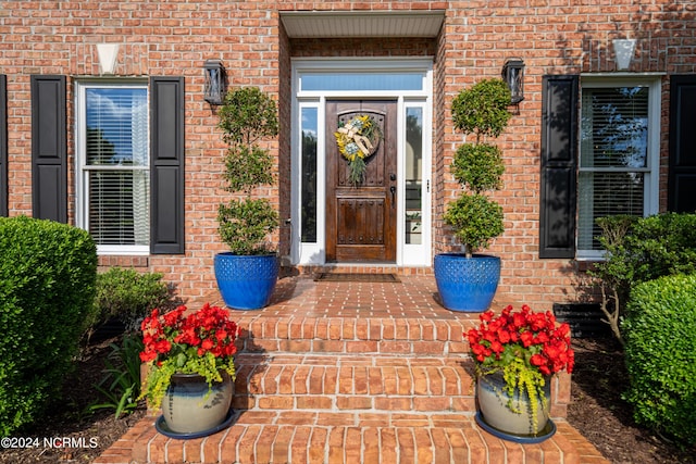 390 Whitebridge Rd, Hampstead, NC 28443 - doorway to property with brick siding