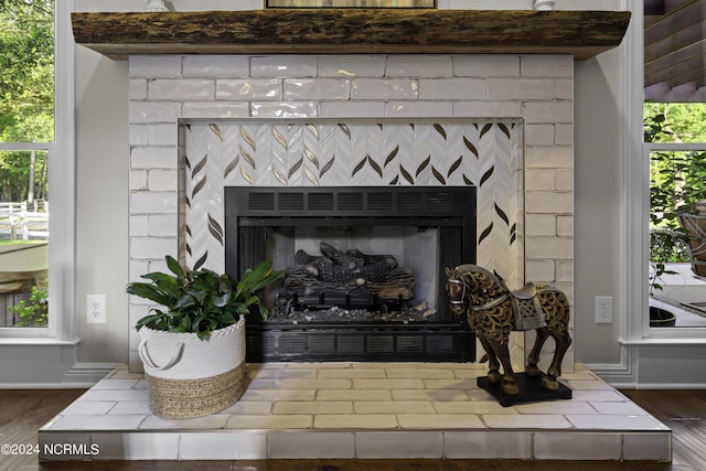 390 Whitebridge Rd, Hampstead, NC 28443 - room details with wood finished floors, a fireplace, and baseboards
