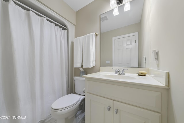 390 Whitebridge Rd, Hampstead, NC 28443 - full bath with toilet, visible vents, and vanity