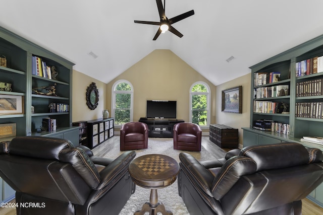 390 Whitebridge Rd, Hampstead, NC 28443 - living room featuring a ceiling fan, vaulted ceiling, visible vents, and wood finished floors
