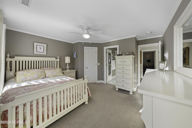 390 Whitebridge Rd, Hampstead, NC 28443 - bedroom featuring ornamental molding, carpet, visible vents, a ceiling fan, and baseboards