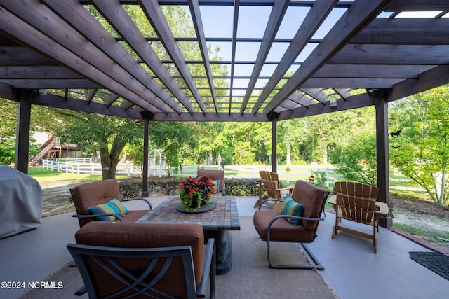 390 Whitebridge Rd, Hampstead, NC 28443 - view of patio / terrace featuring a pergola, an outdoor hangout area, and a grill