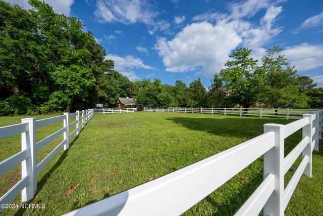 390 Whitebridge Rd, Hampstead, NC 28443 - view of yard featuring a rural view and fence