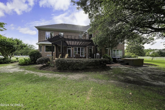 390 Whitebridge Rd, Hampstead, NC 28443 - back of property with a lawn, a pergola, brick siding, and fence