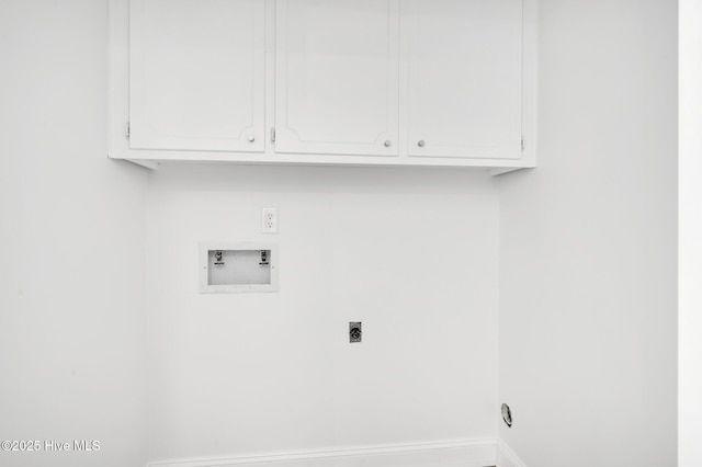 laundry room featuring hookup for a washing machine, hookup for an electric dryer, cabinet space, and baseboards