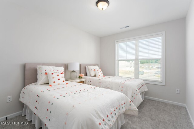 130 Jansen Ln, Winnabow, NC 28479 - bedroom with carpet floors, baseboards, and visible vents