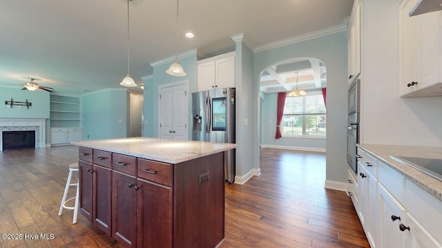 149 Mardella Way, Holly Ridge, NC 28445 - kitchen featuring ceiling fan, crown molding, white cabinetry, dark wood finished floors, and a fireplace