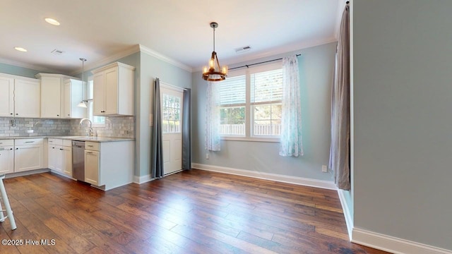 149 Mardella Way, Holly Ridge, NC 28445 - kitchen with ornamental molding, a chandelier, tasteful backsplash, baseboards, and white cabinets