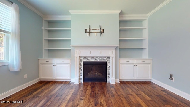 149 Mardella Way, Holly Ridge, NC 28445 - unfurnished living room featuring dark wood-type flooring, built in shelves, a fireplace, and crown molding
