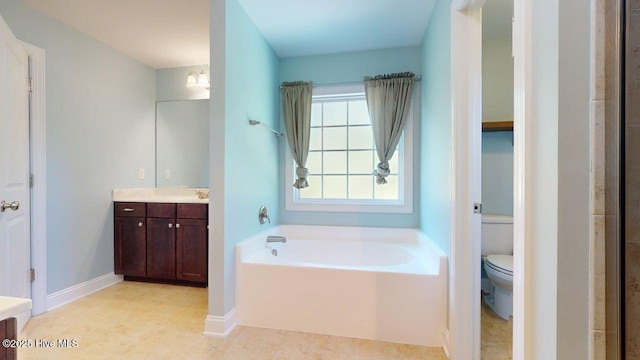 149 Mardella Way, Holly Ridge, NC 28445 - bathroom with vanity, a bath, toilet, tile patterned floors, and baseboards