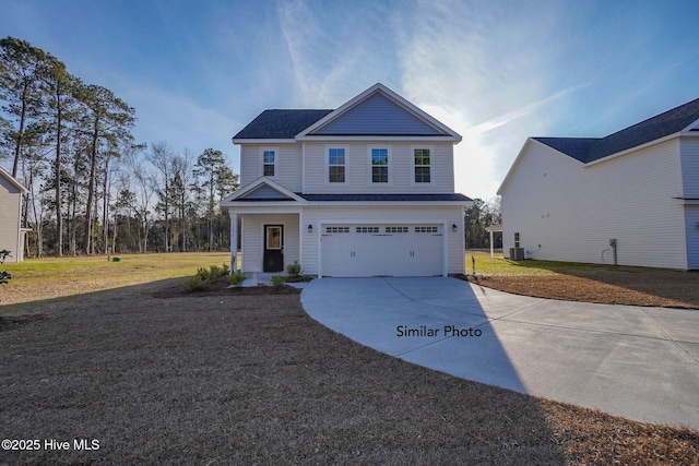 view of front of property with central AC, driveway, a front lawn, and an attached garage