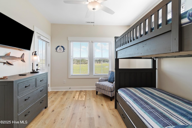 1063 Tide Ridge Dr, Supply, NC 28462 - bedroom with light wood-style flooring, baseboards, and ceiling fan