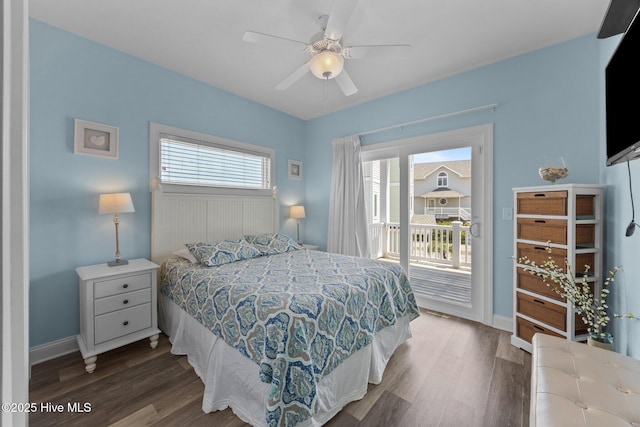 bedroom with access to outside, wood finished floors, baseboards, and a ceiling fan