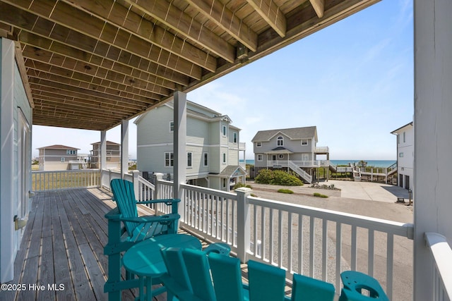 wooden deck featuring a residential view