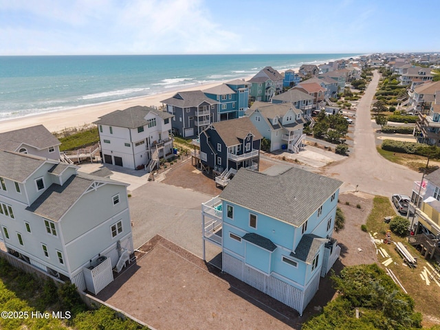aerial perspective of suburban area with expansive beach