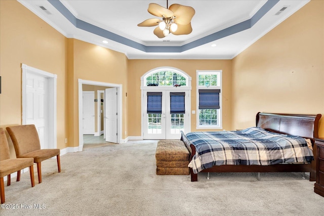 310 Garnercrest Rd, Wilmington, NC 28411 - carpeted bedroom with french doors, ornamental molding, a raised ceiling, baseboards, and a ceiling fan