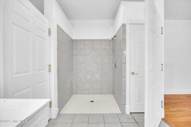 310 Garnercrest Rd, Wilmington, NC 28411 - bathroom featuring a tile shower and tile patterned flooring