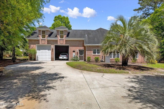 310 Garnercrest Rd, Wilmington, NC 28411 - view of front of property with brick siding, concrete driveway, and a shingled roof