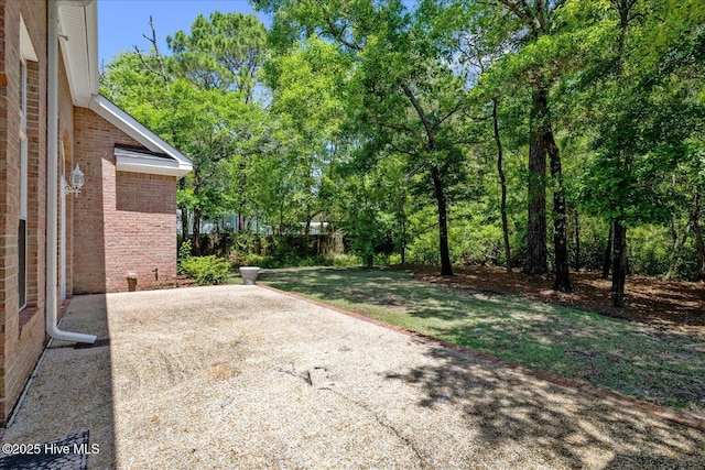 310 Garnercrest Rd, Wilmington, NC 28411 - view of green lawn with a patio