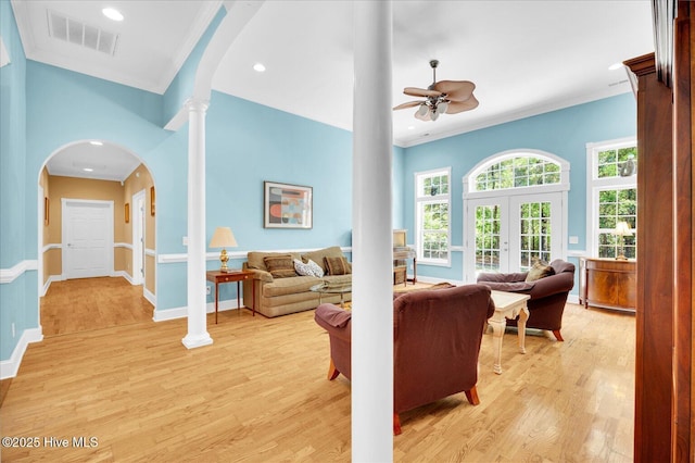 310 Garnercrest Rd, Wilmington, NC 28411 - living room featuring ceiling fan, crown molding, arched walkways, light wood-style flooring, and recessed lighting