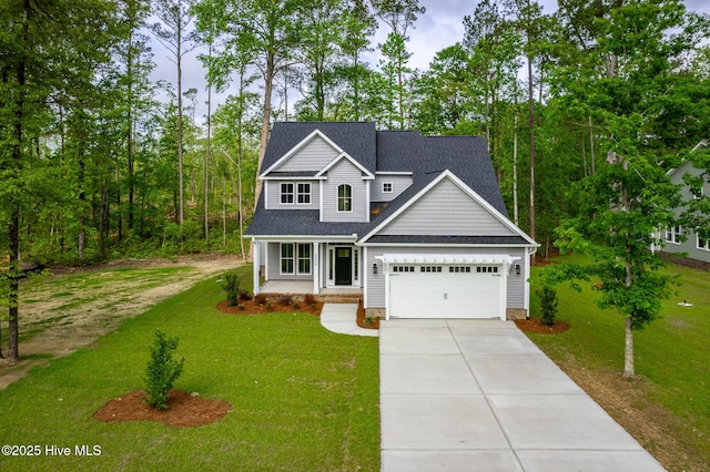 traditional home with concrete driveway, a garage, a front yard, and a shingled roof