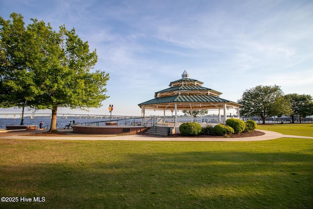 surrounding community featuring a gazebo and a yard