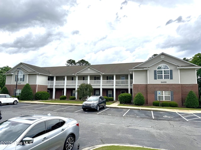 2400 King Richard Ct Unit D, Greenville, NC 27858 - view of building exterior featuring uncovered parking