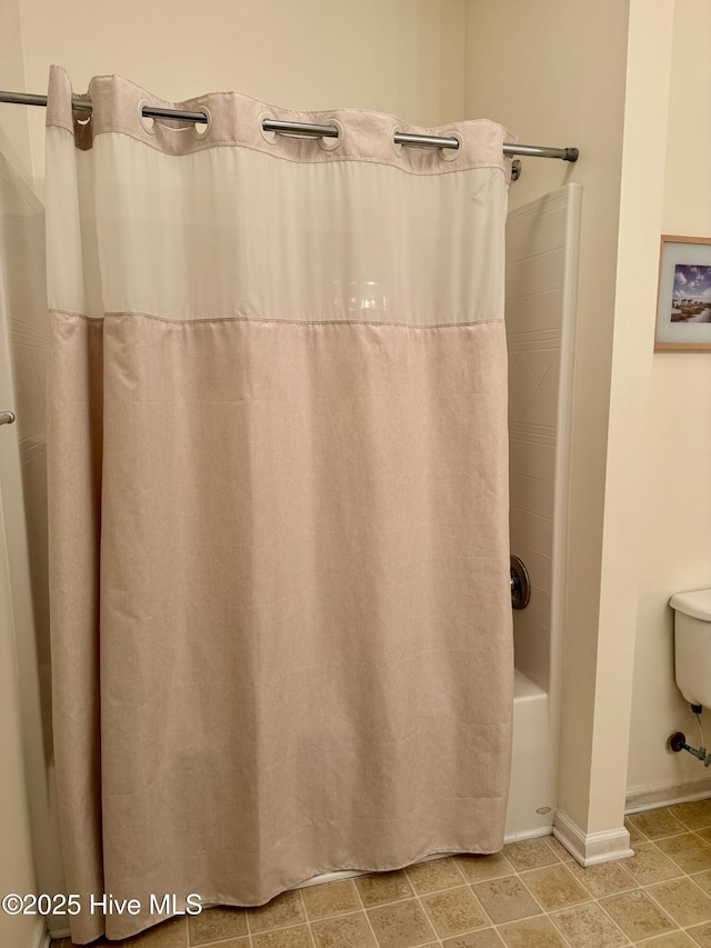 2400 King Richard Ct Unit D, Greenville, NC 27858 - bathroom with tile patterned floors and shower / bathtub combination with curtain