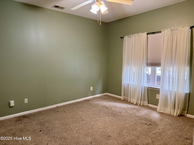 2400 King Richard Ct Unit D, Greenville, NC 27858 - empty room featuring carpet, ceiling fan, and baseboards