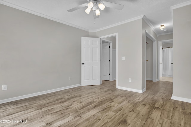 7404 Countywood Way, Wilmington, NC 28411 - unfurnished room with a ceiling fan, light wood-type flooring, crown molding, and baseboards