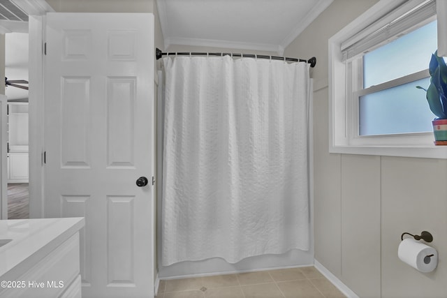 7404 Countywood Way, Wilmington, NC 28411 - bathroom featuring crown molding, ceiling fan, tile patterned flooring, vanity, and shower / bath combo with shower curtain