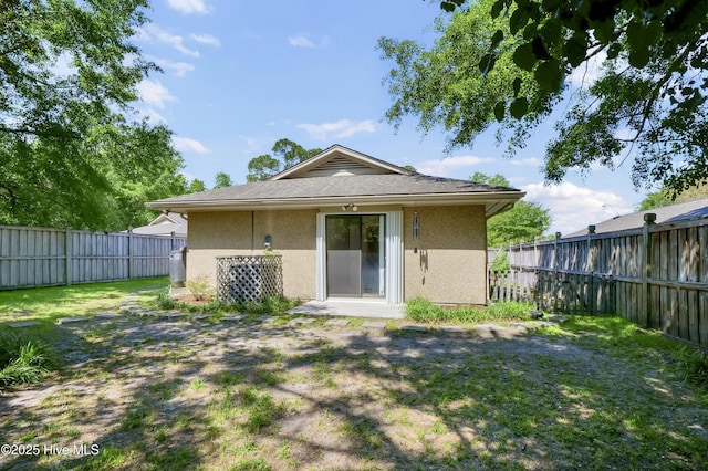 7404 Countywood Way, Wilmington, NC 28411 - back of house featuring stucco siding