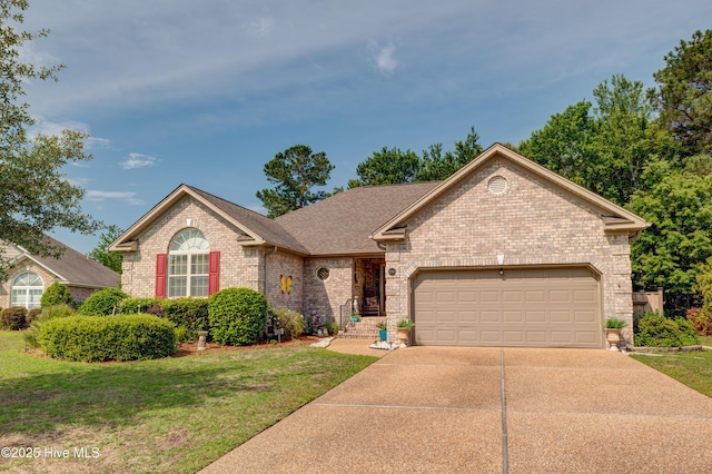 1106 Jamesford Ct, Leland, NC 28451 - single story home with driveway, brick siding, an attached garage, and a front lawn