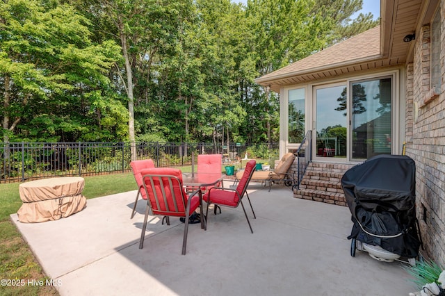1106 Jamesford Ct, Leland, NC 28451 - fenced backyard with grilling area, outdoor dining space, and a patio area