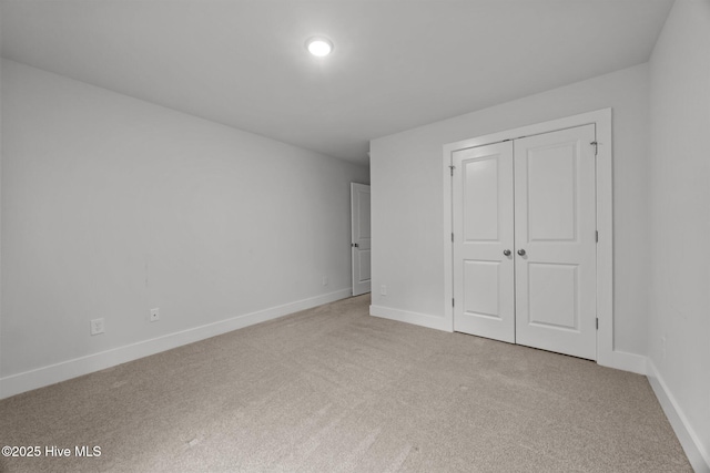 104 Two Sisters Ter, Sneads Ferry, NC 28460 - unfurnished bedroom with carpet, baseboards, and a closet
