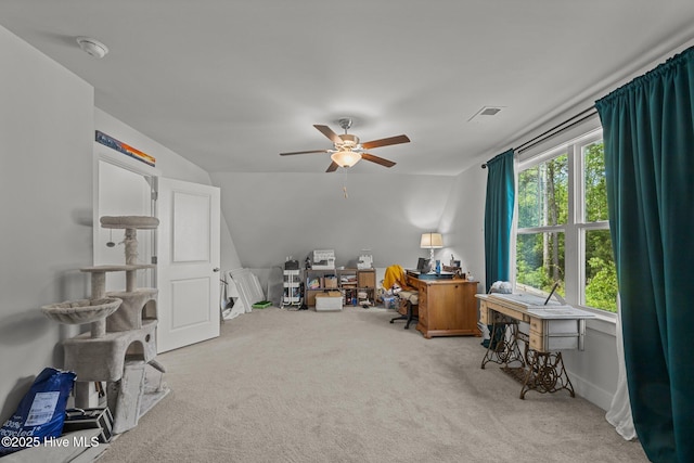 carpeted office featuring a ceiling fan