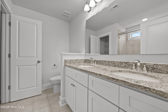104 Two Sisters Ter, Sneads Ferry, NC 28460 - full bathroom with a shower stall, double vanity, tile patterned floors, toilet, and baseboards