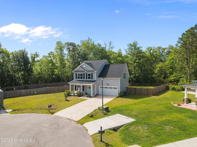 traditional-style home with driveway, covered porch, and a garage
