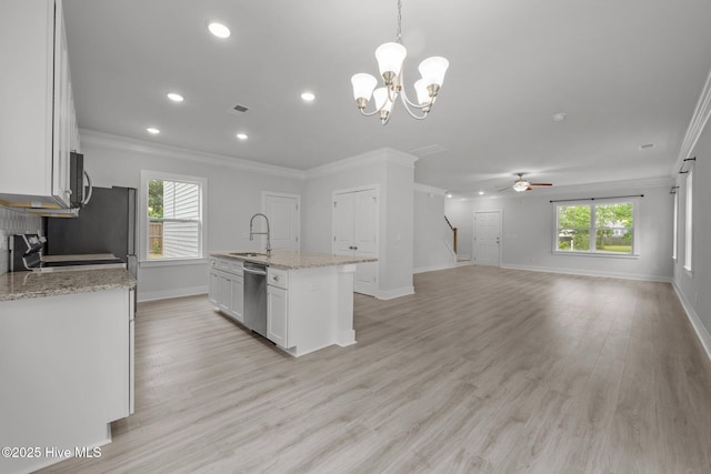 104 Two Sisters Ter, Sneads Ferry, NC 28460 - kitchen featuring ornamental molding, a sink, stainless steel appliances, baseboards, and ceiling fan
