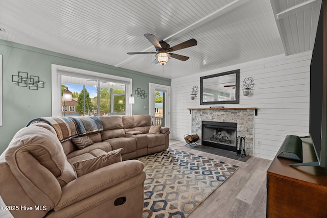 2 Harbour Walk, New Bern, NC 28562 - living area featuring wood finished floors, ceiling fan, a fireplace, wood walls, and wood ceiling