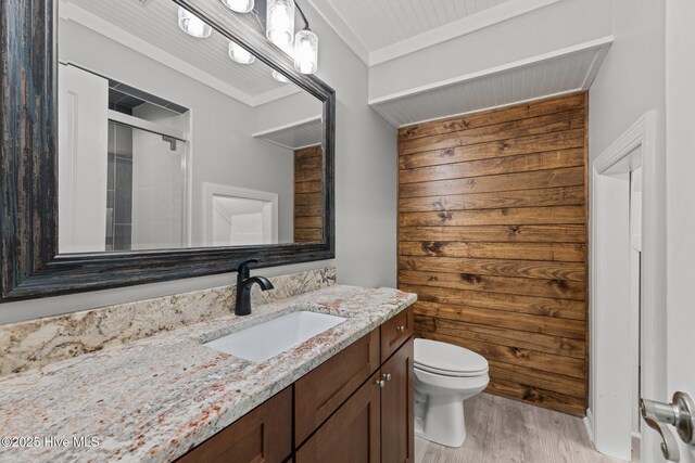 2 Harbour Walk, New Bern, NC 28562 - bathroom with wood finished floors, toilet, vanity, and a shower with shower door