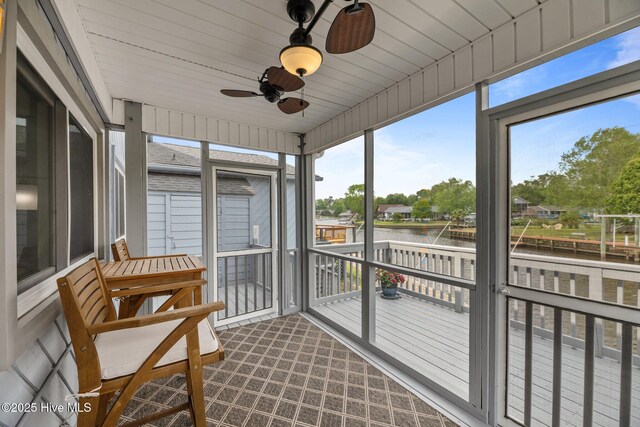 2 Harbour Walk, New Bern, NC 28562 - sunroom with a water view, a ceiling fan, and healthy amount of natural light