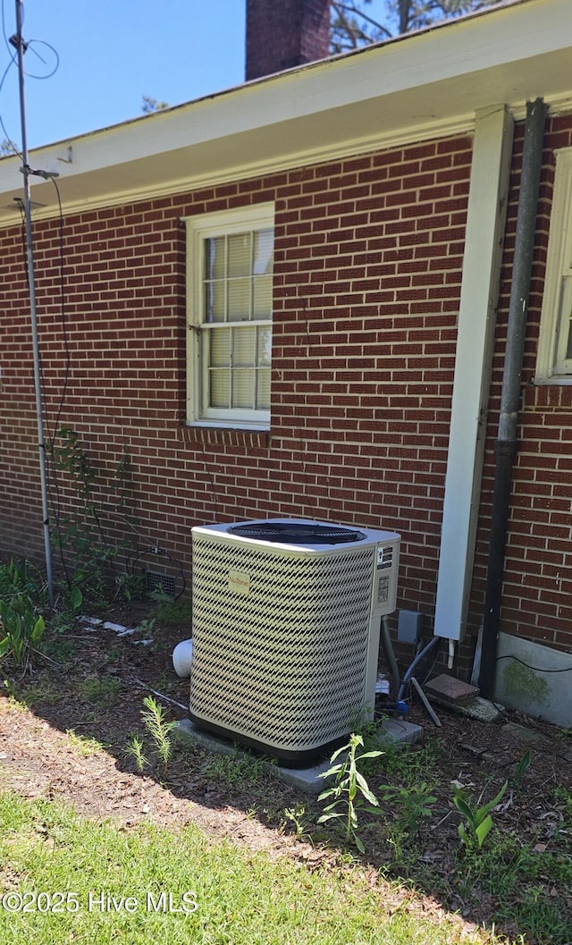 1122 Zion Church Rd, Conway, NC 27820 - exterior view of central air condition unit and brick siding