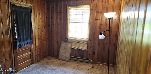 1122 Zion Church Rd, Conway, NC 27820 - carpeted entryway with a baseboard heating unit, wood walls, and plenty of natural light