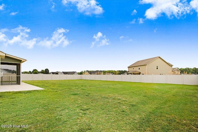 view of yard with a patio area and fence