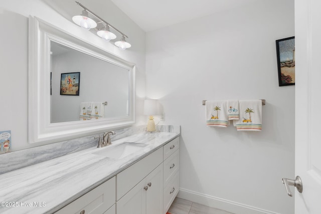 139 Sound Point Dr, Harkers Island, NC 28531 - bathroom with vanity, baseboards, and tile patterned flooring