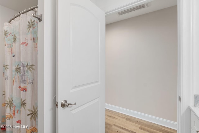 139 Sound Point Dr, Harkers Island, NC 28531 - detailed view of wood finished floors and baseboards